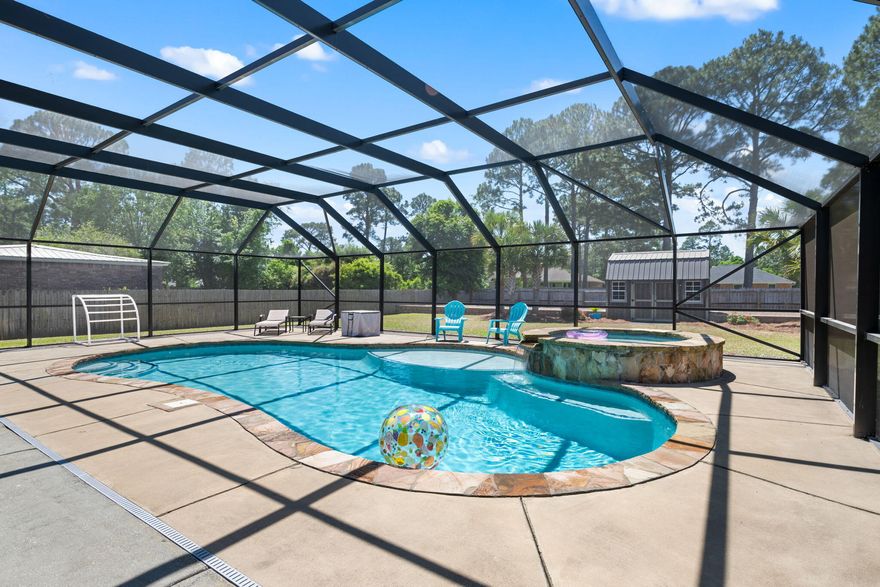 A Hidden Gem of Luxury and Privacy: Your Custom Pool Retreat AwaitsTucked away on over half an acre of manicured grounds, this custom-built pool home offers the perfect blend of comfort, style, and privacy. From the moment you step through the front door, you're greeted by soaring ceilings, an airy open layout, and a neutral color palette that feels both elegant and welcoming.This pristine 4-bedroom, 2.5-bath residence spans more than 2,900 square feet, providing ample space for both entertaining and everyday living. The heart of the home--an expansive kitchen--is bathed in natural light and features crisp white cabinetry, plenty of counter space, and an ideal layout for gatherings big or small. Step outside to your private, screened-in pool area, designed for quiet relaxation or festive weekends with friends. The enclosure ensures total seclusion, allowing you to enjoy every moment in comfort and peace.

The walk-in laundry room is a surprise favoritea space so thoughtfully designed, you'll actually look forward to laundry day. Each bedroom is generously sized, with the primary suite offering a tranquil retreat after a long day.

Beyond the home itself, the low HOA of just $565 per year unlocks access to an impressive suite of amenities: boat launch, tennis courts, sauna, steam room, fitness room, and three additional community pools. It's a lifestyle of convenience and luxurywithout the premium cost.

The sellers are ideally looking for early August or mid-August closing date, but if you need to close sooner, they're open to a rent-back option that could make your transition smooth and seamless. 

Whether you're upsizing, relocating, or simply searching for the perfect Florida lifestyle, this custom pool home is a rare opportunity you won't want to miss. Ready to take a tour?

Please see the FEATURE sheet found on the MLS document section. 
You will love what you read! 
