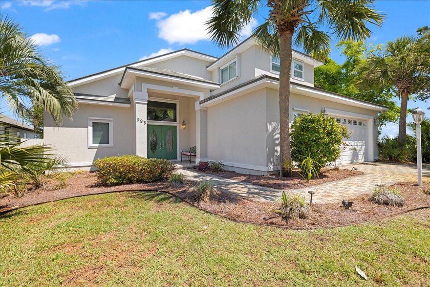 Bayfront Beauty with Custom Features & Breathtaking Views!Don't miss this rare opportunity to own an award-winning, custom-built bayfront home with 85 feet of stunning waterfront. This 3-bedroom, 2.5-bath gem is designed for both comfort and style, featuring a spacious open floor plan, cathedral ceilings, and panoramic bay views that set the scene for peaceful living and elegant entertaining.The gourmet kitchen boasts granite countertops, custom cabinetry, and plenty of space for gathering. Retreat to the master suite and enjoy your private slice of paradise with a tray ceiling, large walk-in closet, and a gorgeous view of the bay to wake up to every morning. This home is packed with premium upgrades, including:

WaterFurnace geothermal HVAC system
Storm shutters & 8-ft wind-rated garage door (perfect for oversized vehicles)
Whole-house generator
Built-in pest deterrent system
Irrigation and security systems
And for boating enthusiasts  there is a boat dock that comes equipped with a boat lift, making it easy to get out on the water at a moment's notice.

This home is the ideal blend of luxury, durability, and waterfront living. Schedule your private tour today and experience bayfront living at its finest!