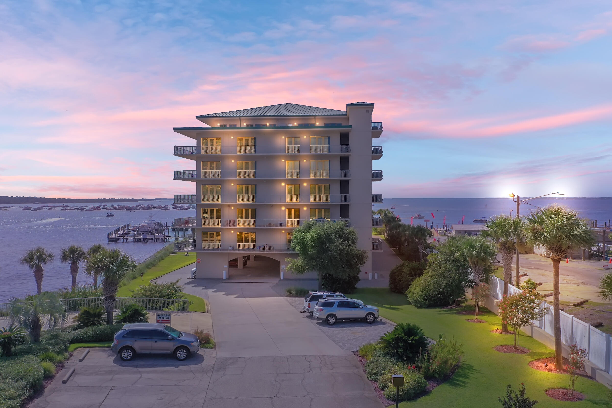 Gorgeous Penthouse with amazing views of the Gulf, Crab Island, and Choctaw Bay are waiting for you! Located steps away from Destin's top restaurants and entertainment venues! Perfect view for the Destin Holiday Boat Parade and seats to the fireworks production weekly in the summer. This  4 bedroom 4 full bath en-suite Penthouse offers over 2800 sqft. of living space high ceilings and crown molding. Large kitchen with granite counter tops, stainless steel appliances, and a double oven to host friends and family. Inside this gated community you will find many amenities that will leave you feeling as though you are on vacation everyday! Penthouse also includes boat slip with sale.
