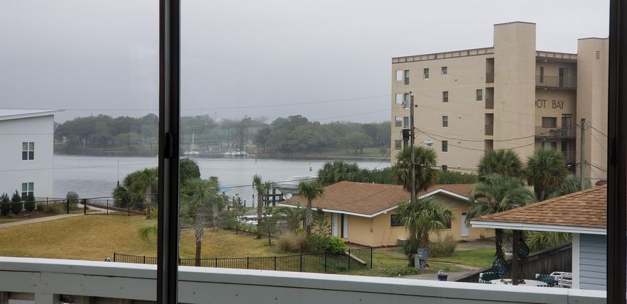 Great investment opportunity on Okaloosa Island with Sound view and beach access just down the street. This end unit has been updated with new cabinets, counters, vinyl plank flooring, lighting, plumbing fixtures, interior paint and more. HVAC installed about 2019, new hot water heater about 2018 and new refrigerator in 2019. Located in a 12 unit complex with covered parking and new dimensional shingle roof. There are other units available starting at $109,900, what a bargain. Zoned for vacation rentals to maximize your income or would make the perfect beach get away. This is the least expensive, updated unit on the island. Don't miss out on this deal.