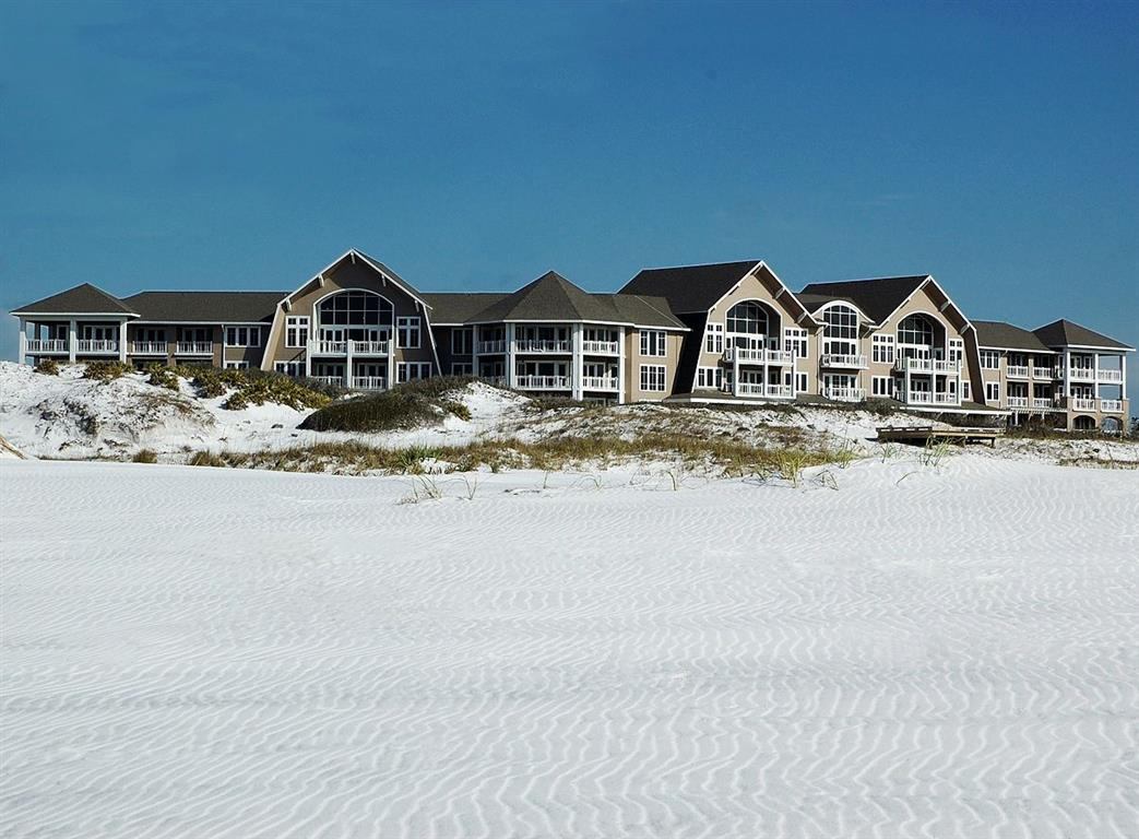 This is a most desired corner unit on the top floor (4th)allowing for incredible views of the Gulf, sunrises and sunsets from inside as well as from wrap around decks. A one story unit with 4 bedrooms, 4.5 baths and the largest floor plan (click on photos) at 2,842 square feet!! Watersound amenities include neighborhood pools, clubhouse, fitness center, foot paths, dune walkovers to the beach and a post office. As an owner, additional amenities are available through the purchase of one of three St. Joe Club & Resort memberships. Click on documents for add'l info and floor plan. Buyers fee of .5% of purchase payable to St. Joe Community Fnd and .25% of purchase price payable to Watersound HOA at closing.