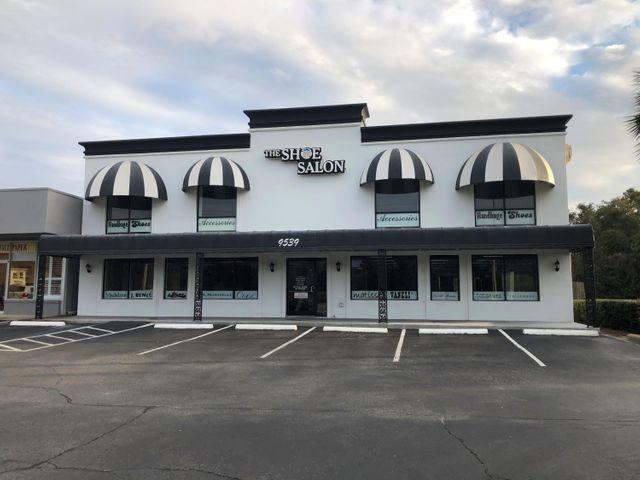 LOCATION, LOCATION!! This meticulously maintained building is located on the South side of Hwy. 98, between the Silver Sands Outlet Mall and Sandestin Resort. Free standing building with 16 parking spots. Great exposure on Highway 98 with nearly 50,000 daily traffic count and all windows on the first and second floor. Perfect for a retail store, office space or general commercial operation. Building can be easily divided into two or four separate businesses if so desired by closing the access to the stairs because the property has four electric meters already in place.  This property is in great condition and is move in ready!