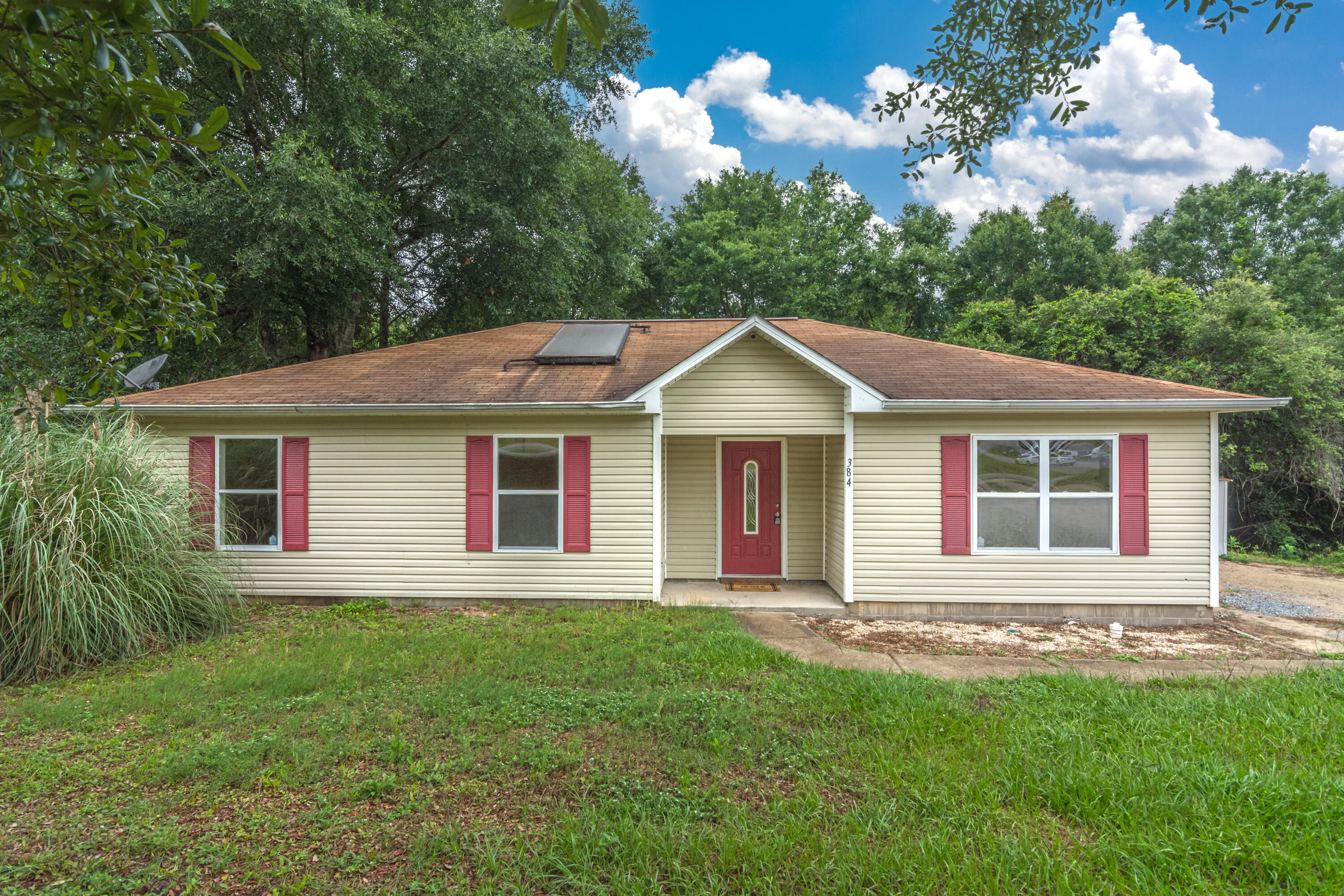 South of I-10 - short distance to nearby bases and beaches. Perfect for a first time home buyer! Laminate wood flooring in the living room, and ceramic tile throughout the rest of the home. Fenced in back yard with fresh sod. Interior updates to include new ceiling fans and new door knobs . Please verify zoning, school zones, and any other information that is important to you.