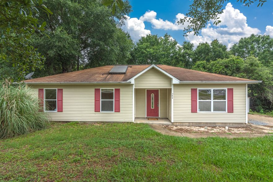 South of I-10 -  short distance to nearby bases and beaches. Perfect for a first time home buyer! Laminate wood flooring in the living room, and ceramic tile throughout the rest of the home. Fenced in back yard with fresh sod. Interior updates to include new ceiling fans and new door knobs . Please verify zoning, school zones, and any other information that is important to you.