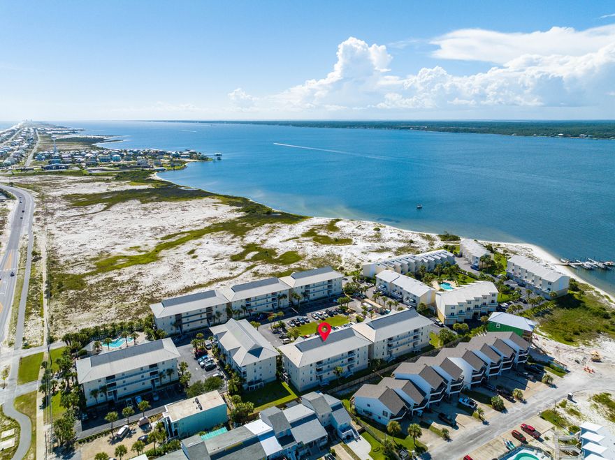 ALL EXTERIOR IMPROVEMENTS COMPLETE AND READY FOR YOU AND YOUR GUESTS TO ENJOY THE BEACH LIFE! Newly decorated 2 bedroom 2 bath rental condo with proven rental history. Sleeps up to 6, offered fully furnished, turnkey, and in a great location on Navarre Beach. As a first-floor condo, this unit hosts queen-sized beds in each bedroom, and an additional pull-out sofa bed in the living area. Granite countertops and stainless steel Kenmore appliances in the kitchen. Tile floors throughout common areas and bathrooms. Within 600 feet to the Beach Access with glistening Emerald-Hued waters and Sugar White sands of the Gulf of Mexico and Santa Rosa Sound. Ideally located close the community pool, this condo is perfectly suited for a second home, investment property, or your primary residence! Navarre Beach is one of the last areas with the "Old Florida" appeal and a fantastic place to live and own a piece of paradise as either a secondary/investment or primary home. Visit the Navarre Fishing pier and Turtle Conservation center to absorb the beach lifestyle. Navarre Beach has miles and miles of white sandy, crowd-free beaches, and stunning emerald-hued waters.