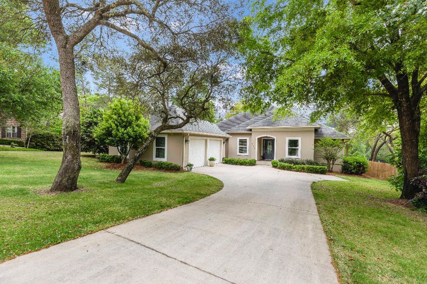 Charming custom single-story home nestled in highly desirable Swift Creek blends privacy & elegance. Enjoy serene outdoor living on the stunning newly constructed, 600 sq ft, multi-tier Trex deck with rain escape system providing over 300 sq ft of enclosed dry storage beneath. Inside, transition across a bright, open floor plan with new custom-built ins showcasing Ash and Spanish Cedar, designed to complement sleek European cabinetry. This beautiful kitchen features island storage, an extra sink, and large pull-out, soft close drawers. The home's heart lies between glass French pocket doors leading into the multipurpose room and the spacious screened porch, overlooking the deck. Experience the best neighborhood amenities in the heart of Niceville paired with the feeling of country living!