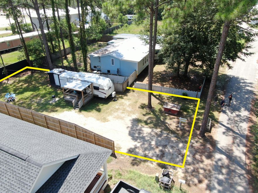 Discover the perfect setting for your dream home on this prime lot, nestled in the heart of Santa Rosa Beach.The area is buzzing with new home constructions and lot acquisitions, signaling its growing appeal.Enjoy the freedom of no HOA restrictions and no mandated build-out timelines. Plus, the county maintains the road, ensuring easy access.The property is already cleared and ready for development. Its central location offers the best of Santa Rosa Beach at your doorstep: dine at nearby restaurants, indulge in shopping, or relax on the pristine white sandy beaches. For nature enthusiasts, nearby hiking trails and parks provide boat access for added adventure. Prospective buyers are encouraged to conduct due diligence to verify all information, measurements, and other details deemed essential.

The travel camper is not included in the sale.