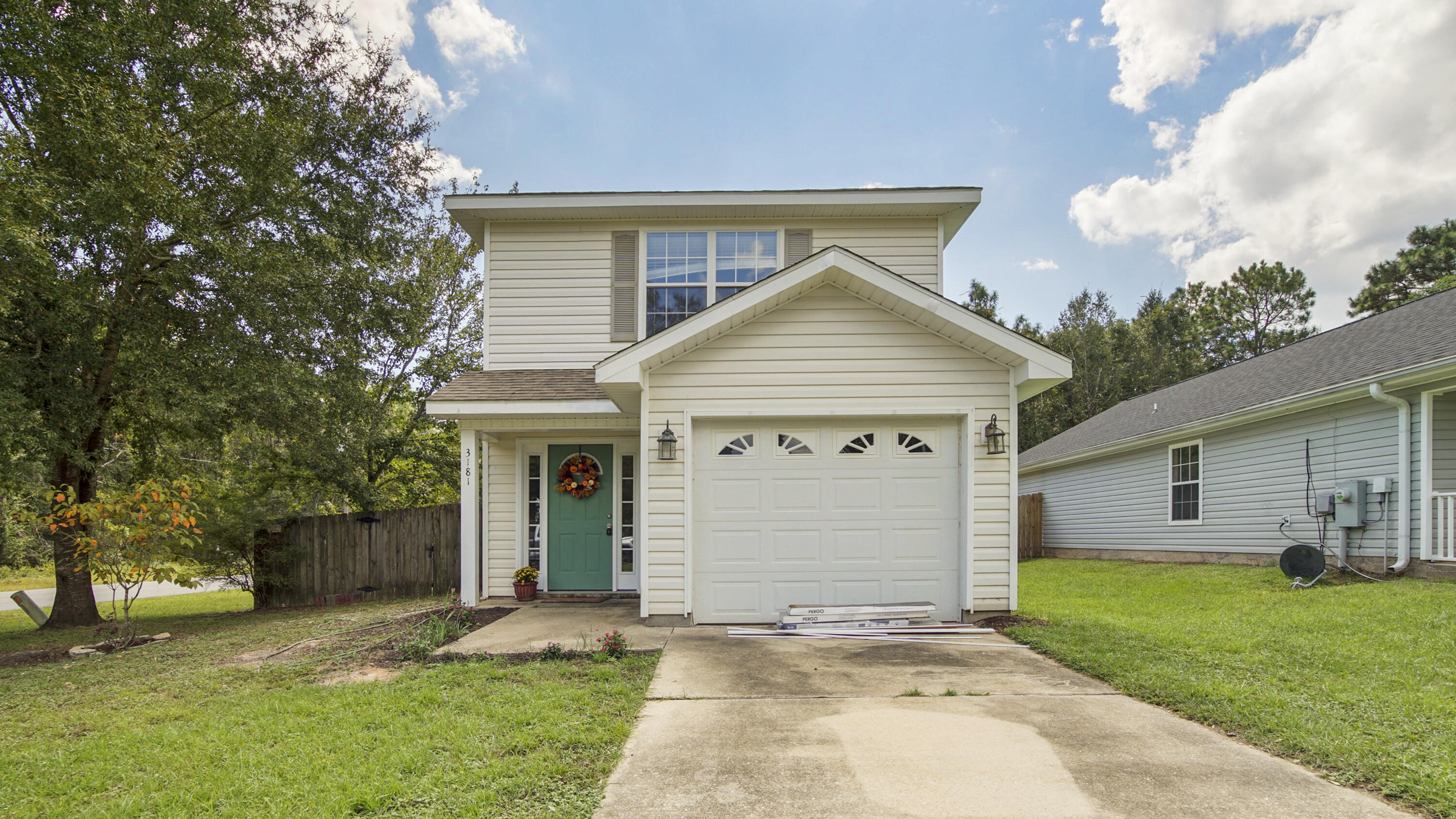 Beautiful starter home with COUNTY TAXES! This affordable home features an open spacious kitchen with breakfast bar and cherry cabinets with tons of storage. Refrigerator is 1.5 years old and the dishwasher is 3 years old. Fresh paint throughout, new water heater, new flooring in the bedrooms and main living area. HVAC replaced in 2017. The back door leads to open patio into a fenced backyard. The only thing this home is missing is you. Make your best offer today! Seller is offering $10,000 in concessions with a full price offer. The buyer can use the money towards new roof (roof estimate available) flooring, buy down rates or closing fees.