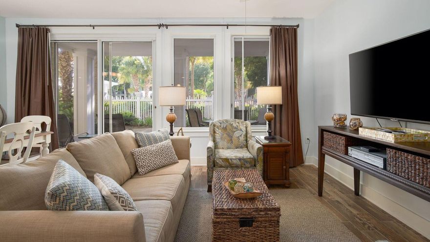 Absolutely the best location at Pilot House located on Baytowne Wharf Boulevard, Sandestin Resort! This beautifully decorated two bedroom, two bathroom condo is situated on the amenity level of the Pilot House, only a few steps away from the sparkling lagoon swimming pool! Spend time lounging on the poolside patio & taking in the tropical ambience; or wander over to the sugar white beach, or entertain yourself at Baytowne Wharf, or swim in the most beautiful pool in the Resort.This sunny & spacious condo is beautifully decorated in warm coastal style, with wood tile floors in the living area.This condo is a vacation rental success, grossing over $40,000 in rental revenue alone the past 12 months. You can have your dream vacation home & a solid income producing investment all in