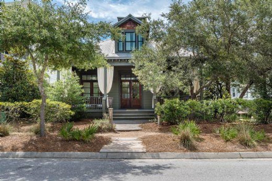 This cozy WaterColor cottage is located just over the Western Lake pedestrian bridge and backs up to a beautiful, natural open space. This home boasts a private location and is conveniently located near The Boathouse for canoeing, stand up paddling or kayaking on the beautiful Dune Lake - Western Lake, The Beach Club, and four additional community pools! This special house, built by Logan and Logan Construction, sleeps twelve and offers room for a one car garage with a carriage house! Logan and Logan Construction has built several true ''beach cottage'' homes in WaterColor, some of which have even been featured in Better Homes & Gardens and Coastal Living Magazines. Additionally, this home is only a short stroll to the various boutiques, tennis courts, and local eateries in WaterColor!