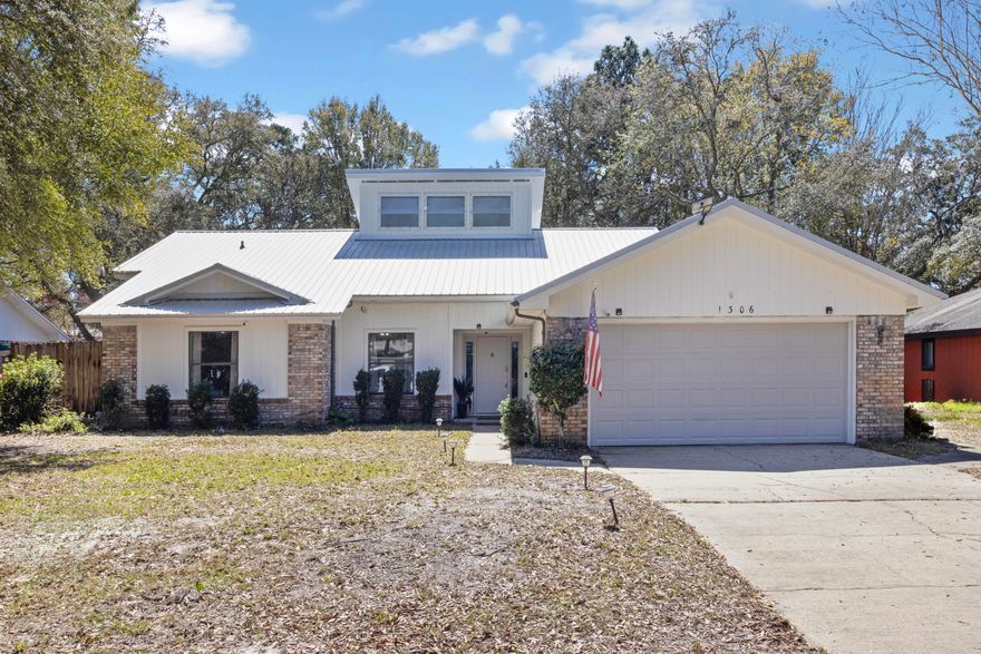 Nestled in the heart of Bluewater Bay, this home sits on a spacious lot in the desirable Woodlands neighborhood minutes from Niceville shopping and amenities. With a well-designed floor plan, it offers a large dining room and a kitchen featuring granite countertops and ample cabinet space. The master suite boasts vaulted ceilings, dual vanities, a garden tub, and a separate shower. Two additional bedrooms share a full hall bath. The great room impresses with a stunning floor-to-ceiling brick fireplace, leading to an enclosed Florida room overlooking the large, fenced backyard. Enjoy top-rated schools, parks, and quick access to Destin's beaches! 2020 metal roof and HVAC! Contact today for a private showing!