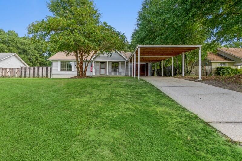 Located SOUTH OF I-10! This 3 bedroom 1.5 bathroom home on a 0.39 acre lot. This home will have a NEW dimensional shingle roof installed prior to closing. It has a brand new AC and gas furnace, new paint, new carpet, as well as some new ceiling fans and light fixtures. The home offers a spacious living room, large open kitchen with dining area, master bedroom with walk-in closet and master bathroom access. There are two additional bedrooms and a half bathroom located in the hallway for guests. Don't miss the HUGE bonus room the could be used for many purposes: mancave, tv room, recreation room/pool table, indoor gym etc. The large lot offers a spacious front and backyard with mature trees. The backyard has two sheds, outdoor patio, and fence. The driveway has covered parking for 3 cars.