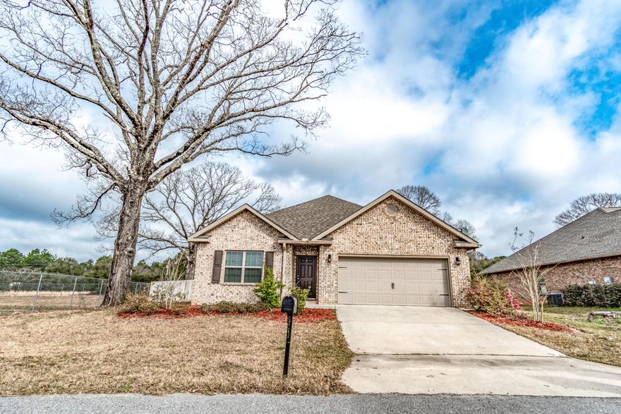 This gorgeous all brick home is located in Autumn Woods. The location is convenient to schools, shopping, restaurants, etc. The home features 4 bedrooms and 2 bathrooms in a split floor plan configuration. The Rhett plan has a large open plan for the kitchen, dining area, and Great Room. The kitchen has a large island perfect for prep work, serving or casual dining. Both the Great room as well as master bedroom have trey ceilings with crown molding to further accent them. The Master suite is located to the rear of the home and features a bathroom area with separate tub and shower, double sink vanity a large walk in closet. The back yard is fully fenced and features a large above ground pool for cooling off in during the warm days. You need to take a look at this home while still available