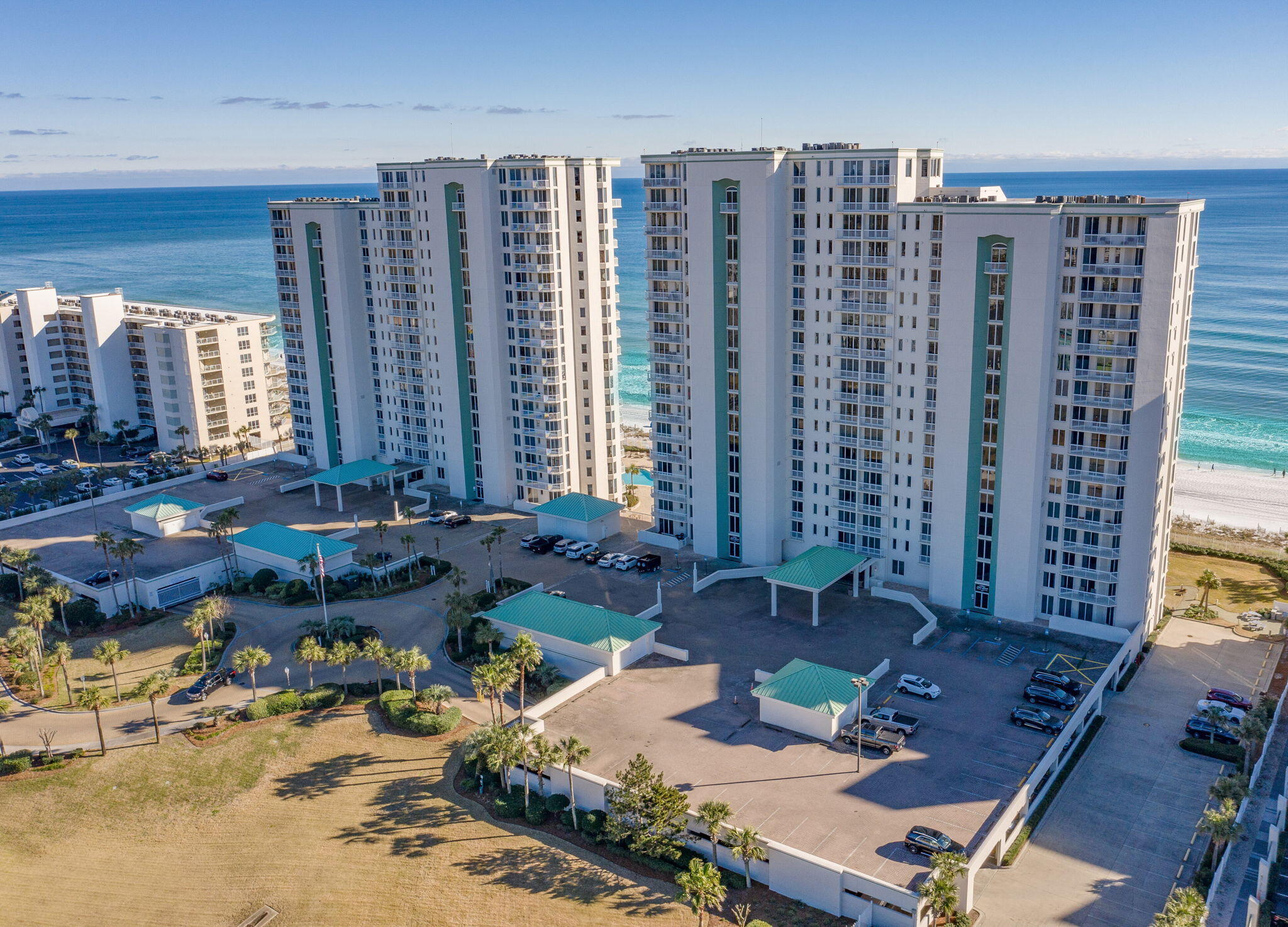 Experience coastal elegance at its finest with this rare 4-bedroom, 3-bathroom gulf-front condo at Silver Beach Towers 1101E, located on the eleventh floor in the heart of Destin, Florida. Spanning 2,080 sq. ft., this end-unit underwent a complete top-to-bottom remodel within the last couple years, showcasing modern upscale finishes and breathtaking panoramic views of the Emerald Coast. Property Highlights:
Spacious Layout: Open-concept living area with high-end furnishings, floor-to-ceiling windows, and a large flat-screen TV. The expansive wrap-around balcony offers unparalleled Gulf and Choctawhatchee Bay views from the North balcony.
Gourmet Kitchen: Fully equipped with stainless-steel appliances, granite countertops, and ample cookware.
Elegant Dining: Seating for eight, perfect for entertaining.
Bedroom Configuration:
Master Suite: King bed, walk-in closet, flat-screen TV, private balcony access, and en-suite bathroom with mosaic tile, soaking tub, walk-in shower, and double vanity.
Guest Bedroom 1: King bed, flat-screen TV, private north balcony access, and en-suite bathroom with walk-in shower.
Guest Bedroom 2: Queen beds with north balcony access.
Guest Bedroom 3: Full-over-full bunk bed, ideal for kids or guests, with north balcony access. Full guest bathroom with tiled walk-in shower.
Prime Location: Centrally located in Destin, with direct beach access to Destin's white-sand shores, close to premier dining, shopping, and entertainment. Enjoy easy access to water sports, golf, and family attractions, with stunning views of the Gulf and Choctawhatchee Bay from the north balcony.
This meticulously updated condo combines luxury, functionality, and an unbeatable location, making it a perfect primary residence, second home, or investment property. Don't miss the chance to own a piece of paradise at Silver Beach Towers! Buyer to verify all information