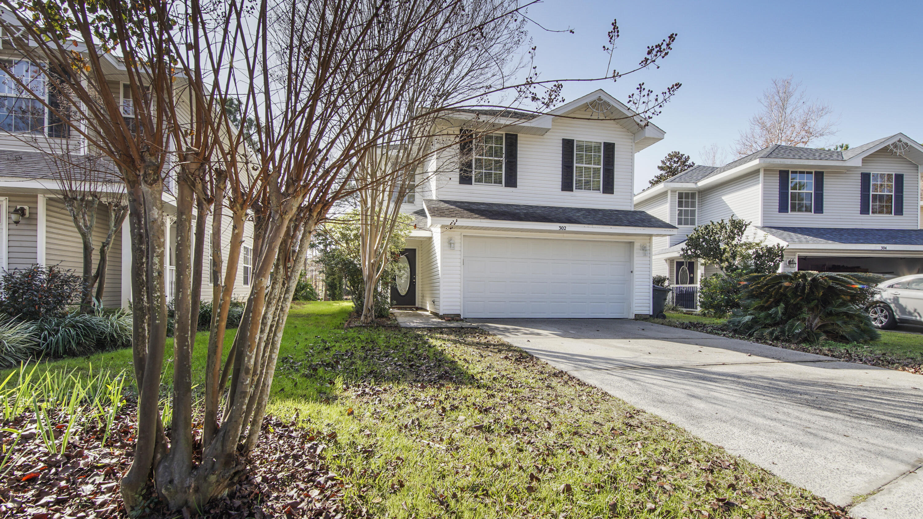 Welcome to 302 Liriope Loop, a modern lakefront sanctuary nestled in the heart of Destin, FL in Twin Lakes. This light and bright, large home boasts a spacious 2,256 square feet of living space and is thoughtfully designed to offer both comfort and style. Step inside to discover a 16-ft tall foyer and wonderful floorplan that flows effortlessly, with an open kitchen-dining area that serves as the heart of the home, featuring custom cabinetry, sleek granite countertops and stainless-steel appliances. The backyard deck overlooks very private lake frontage and is a beautiful tranquil spot from sunrise to sundown! This newly renovated home features beautiful classic herringbone laid porcelain tile floors on the main level, freshly painted throughout and smoothed ceilings just completed, ne w lighting and fans, and a plethora of thoughtful upgrades. Meticulously clean and move-in-ready! All major systems have been updated. Featuring four bedrooms, plus a bonus room that could be a 5th bedroom, and 2 ?? baths, including a primary suite complete with a huge walk-in closet. Step outside to a massive private deck where you can take in serene lake views. There is a lawn pump and irrigation system, and also a Sentricon termite system. The property includes a 2-car garage for secure parking and additional storage and is superbly located on a quiet lakeside cul-de-sac with sidewalks and the neighborhood playground a short distance away. The property offers proximity to the world's best beaches, a full-service marina and the Destin Harbor providing easy access to the water for boating enthusiast, first-class dining and retail, and the local Destin Airport for private plane enthusiasts! Top-rated Okaloosa County schools and private school options available. Experience the perfect blend of modern design and natural beauty at 302 Liriope Loop. This home is a true GEM in Destin, ready to welcome you to a lifestyle right on the Emerald Coast at a compelling price point.
