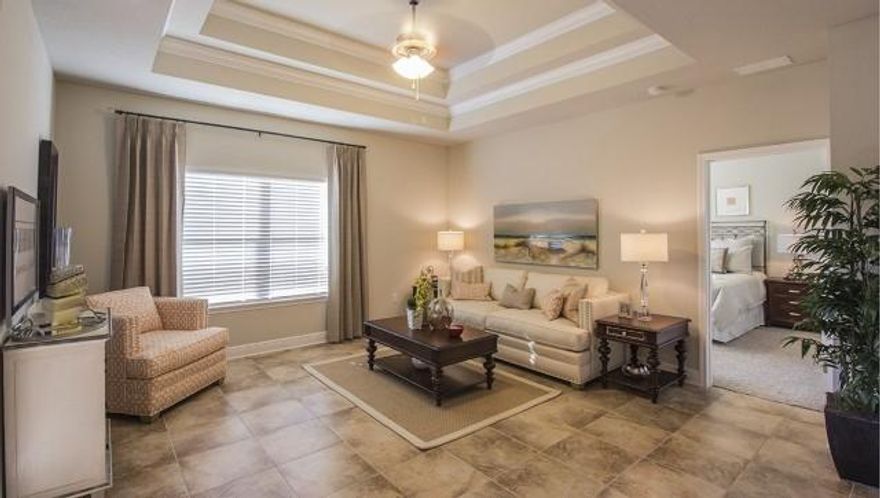 Great Location.. Community Pool.. The Rhett is a spacious floor plan with 4 bedroom and 2 full baths. Beautiful kitchen with granite countertops, open to dining area, island, pantry and G. E. Stainless Steel appliances. Master suite has a private bathroom with garden tub, separate shower and large walk in closet. Luxury vinyl plank flooring in the foyer, kitchen, bathrooms and laundry room. Covered back porch, level lot and 2 car garage. Listing Broker/Salesperson has ownership interest in the property. Photos may be of similar, but not necessarily the same home.