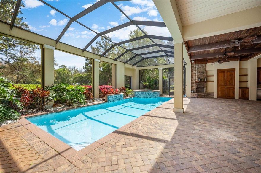 Prestigious Burnt Pine in convenient Arrowhead and perfectly situated on the golf course. Seldom used under current owner, this home is ready for your personal touches. Main floor living includes dual living areas, master suite, an additional bedroom suite. An additional bedroom/bath and study plus wet bar are located upstairs. This home is made for outdoor living with a screened lanai, outdoor fireplace, outdoor kitchen, heated pool, and hottub. Upstairs, the deep balcony takes advantage of golf course views.