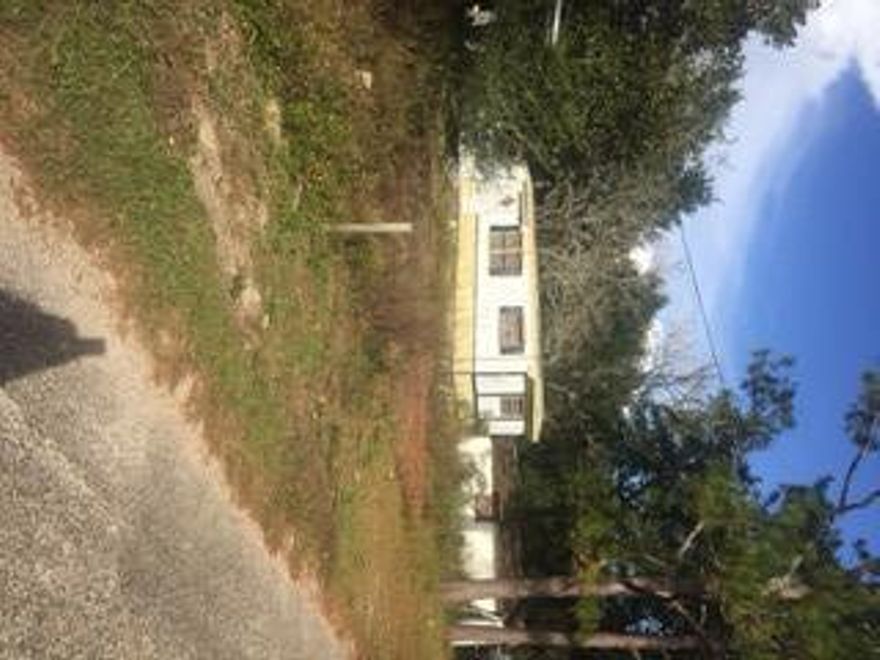 Property begin on the corner of Davis and Andrews and goes to next street. There are 6 mobile home lots and a house. They all need work. There are 7 water meters and units are on city sewer. Property is sold ''as is''.