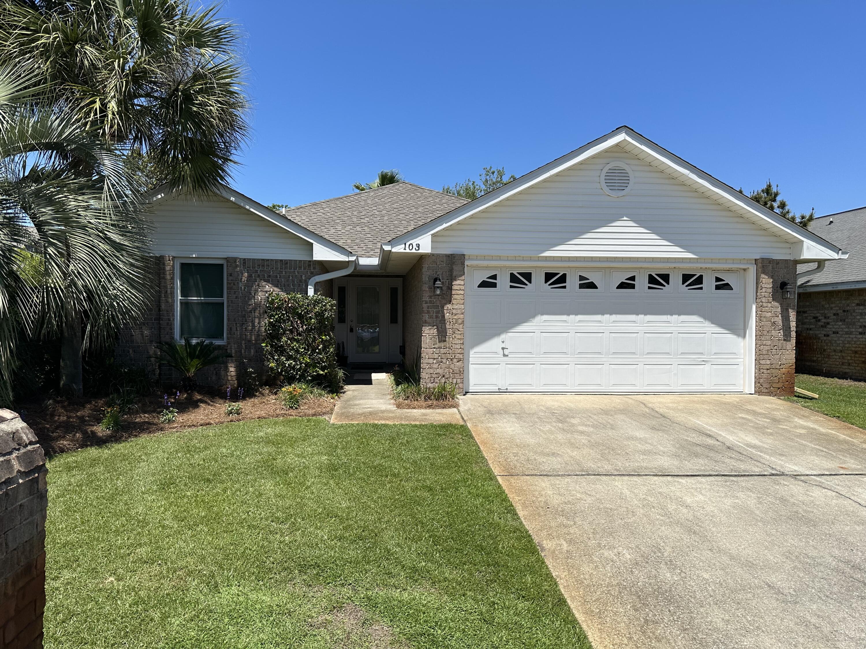 This lovely 4 bedroom 2 bath home is located in a quaint subdivision in proximity of the beautiful white sandy beaches and blue waters of the Gulf of Mexico. This home features a split floor plan , 2 car garage , fenced in back yard to entertain your friends and family. The bedroom carpets have been replaced, wood flooring in the living room, and kitchen area, master bedroom features double vanities, a standalone shower and a garden tub. Private beach access and a community pool add to its value. Lawn Care Included. Pets(2). upon owner approval. Sorry No Cats No Smoking