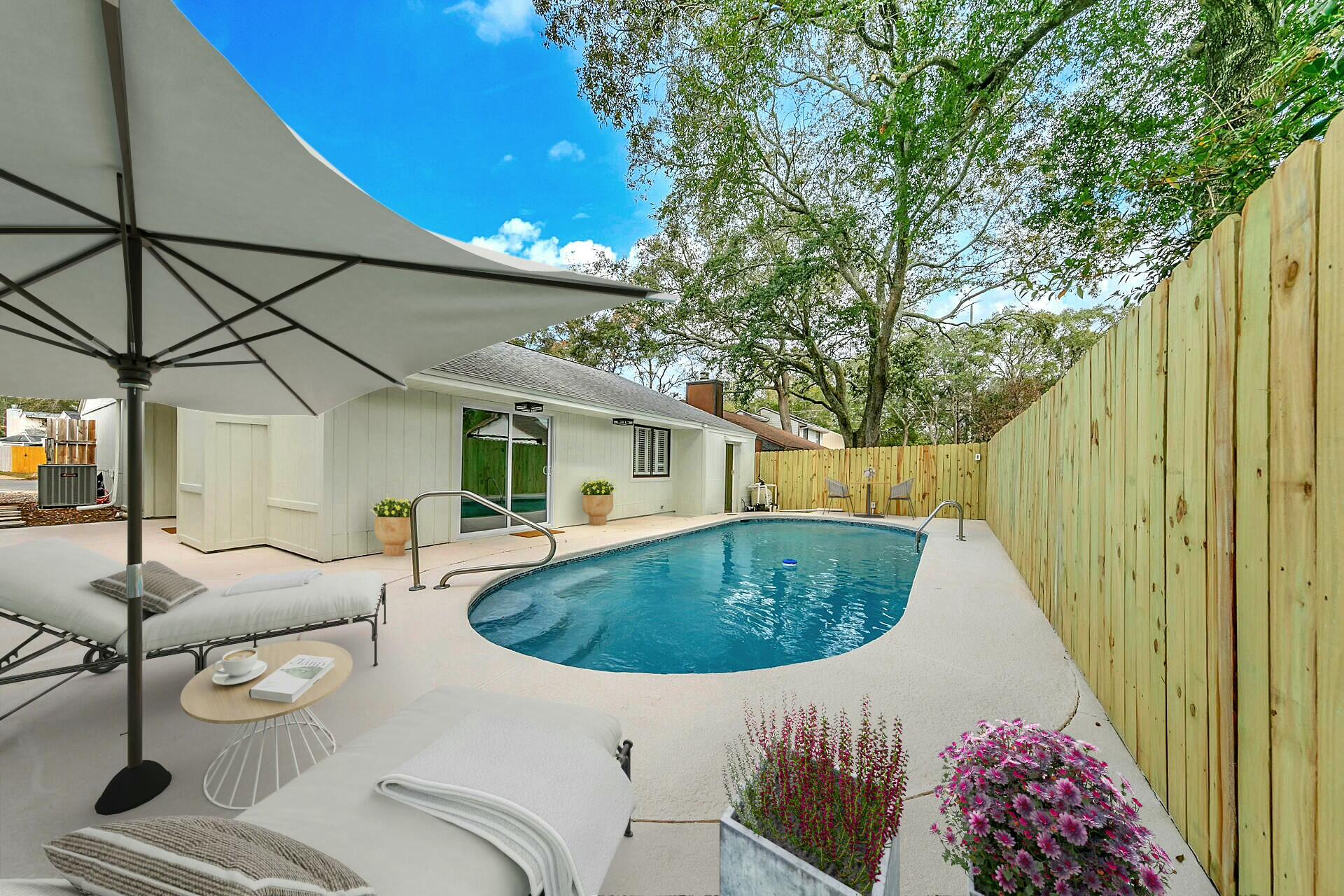 Fall in love this completely renovated 1,000 sf, 2-bedroom, 2-bathroom pool home, where timeless charm and modern luxury come together to create the ultimate retreat. Designed for effortless living, this single-level Florida cottage home features soaring cathedral ceilings centered around a natural wood beam and natural elements such as real wood accents, exposed brick, and muted tones. The spacious living room is the perfect place to host and entertain leading out to the completely sealed and painted patio surround. Grill out and enjoy the summer nights while hosting friends and family in your in ground pool. nside, every inch of this home has been thoughtfully updated, featuring luxury vinyl plank flooring and new low-emission paint for a fresh, modern feel. Both bathrooms have been upgraded with brand new vanities and quartz countertops, new showers, new modern light fixtures and all new finishes. The kitchen is a dream with all new stainless steel appliances, muted subway tile backsplash, light quartz countertops for a clean and fresh feel and all new lighting and finishes. Even the garage is an organizer's dream with painted and sealed floors and pegboard walls, the perfect place to store your tools and so much more.
Perfectly situated just minutes from top-rated schools, the local college, shopping, and both military bases, this home offers the best of both work and play. Surrounded by friendly and active neighbors, you are always guaranteed to see people running, walking and enjoying this beautiful serene neighborhood.
All the major systems are new or newer with the Roof having been replaced in (2014), the HVAC (2020), the Water heater (2013) and the pool resurfaced in (2025). Don't miss this rare opportunity to own a move-in-ready home where modern updates meet timeless charm. Schedule your showing today!