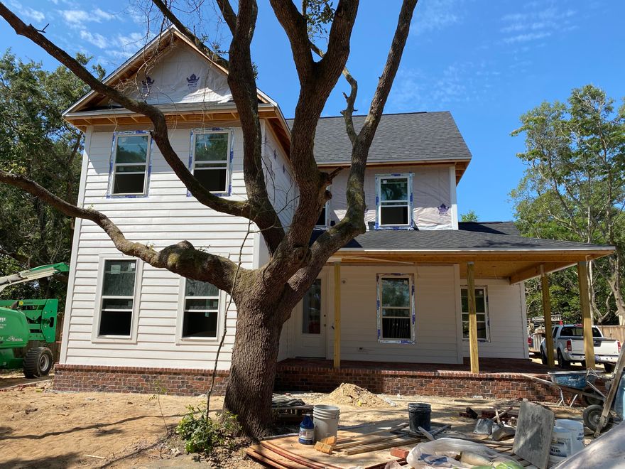 Waterfront on Tom's Bayou! Features include but not limited to: dock with viewing deck, seawall, 24k KW Generac home generator, bonus room upstairs with heated and cooled storage room, two 2 speed HE HVAC systems, foam insulation, circle drive, bricked porch and patio areas, Everlast low maintenance siding, impact windows and doors, separate dining room, computer area upstairs between the bedrooms, en suite bath in one of the bedrooms, stacked stone fireplace and so much more. Estimated completion August 2021 (weather permitting).