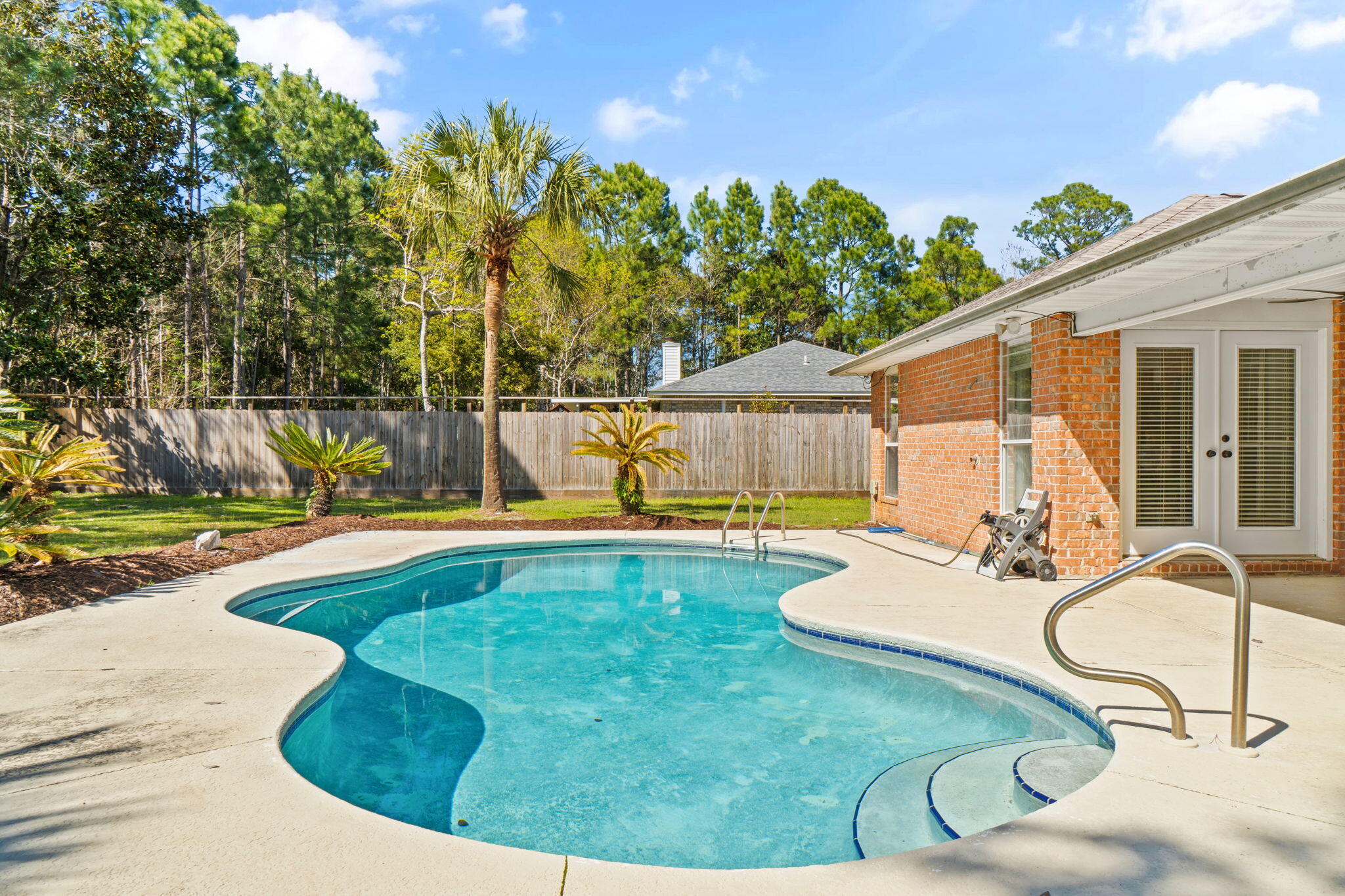 Welcome to the pool home you have been waiting for! This property is situated on .34 acres and fully fenced with an extra driveway and hookup for your RV/Camper. No HOA either so bring your boat and other recreational toys home. This spacious home features plenty of natural light pouring in while overlooking the pool. The kitchen features a wrap around high bar top and a separate dining room or office space. The breakfast nook overlooks the pool and so does the master bedroom. This room is so large, you can add an additional sitting area or extra large furniture. Mature landscape and plenty of curb appeal as soon as you pull up to this beautiful brick home with a side garage and extra long driveway. Brand new tile flooring and new sea foam coastal colors are throughout the home. Come see this one in person and call this one, HOME! 