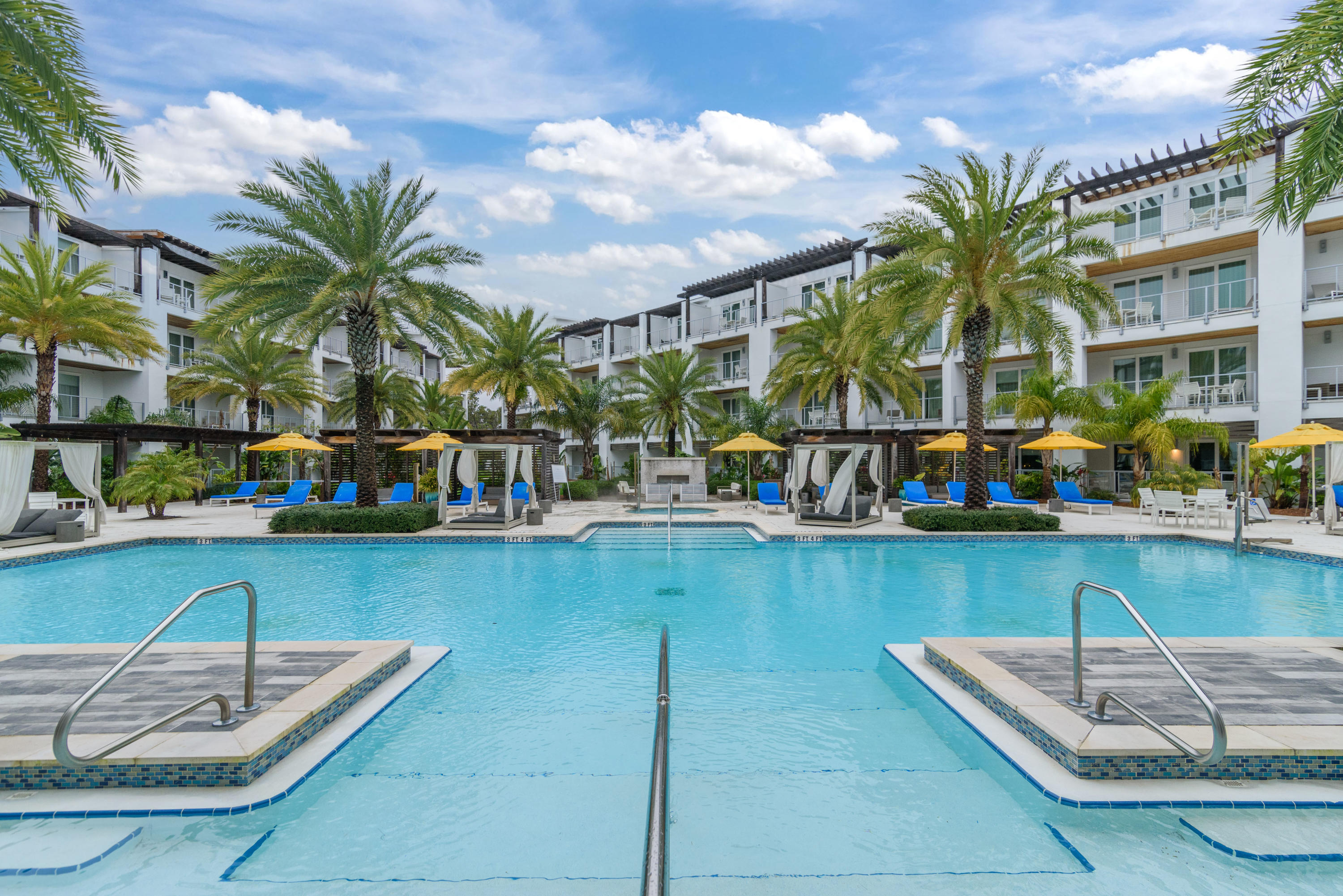 *Model Virtual Tour Available*This three-bedroom three-bathroom condo offers gorgeous views of the palm trees and cabanas around the Caribbean-style pool at this luxurious architectural award-winning resort on the east end of 30A. Directly next to Rosemary Beach, at the intersection of Hwy 98 and Hwy 30A, just across the street from the shops and dining of 30 Avenue, this is a coveted piece of real estate on 30A. Just four years old, this fully-furnished condo offers the finest in amenities you won't find elsewhere: recycled glass countertops, Restoration Hardware furniture, Whirlpool appliances with a gas cooktop, a gas fireplace, private balconies off the living room AND main bedroom.