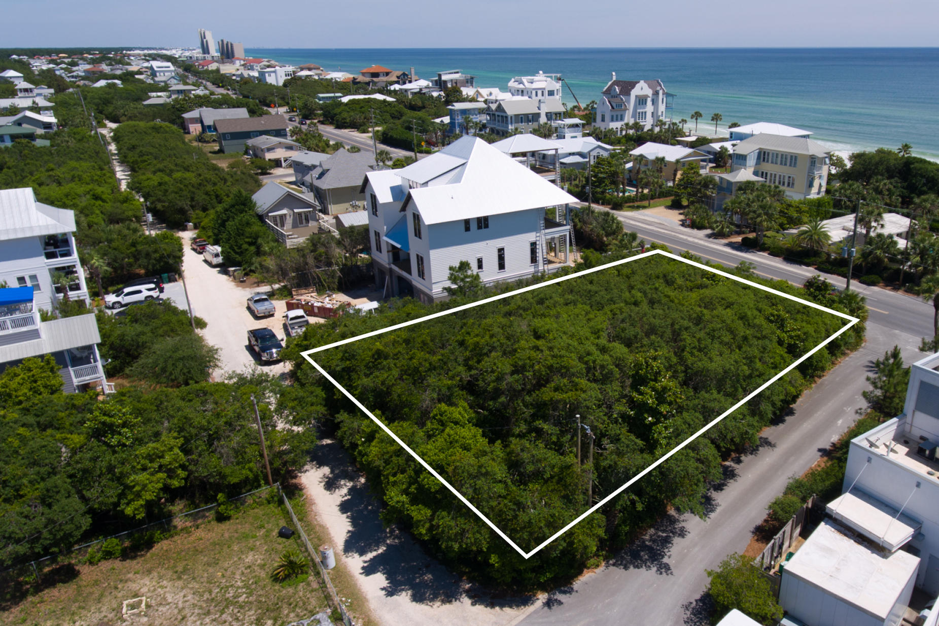This lot is bounded by 30A on the south, Headland Ave on the west and Birmingham St on the north.Let your client choose!Here is a rare opportunity to own .21 acres fronting 30A zoned VMU or build a home with a rear entry off of Birmingham Street so the buyer and their guests never have to wrestle with traffic on 30A to come home or visit. It is currently zoned VMU but perfect for a private Estate Residence.This lot is elevated and would offer unobstructed views of the gulf starting on the second floor. Preliminary house plans are included and would still allow modifications to make this home custom to a buyers lifestyle and taste.Convenient to beach walkovers and to restaurants. You can pass only two homes to get to the beach!Buyer to verify all measurements and