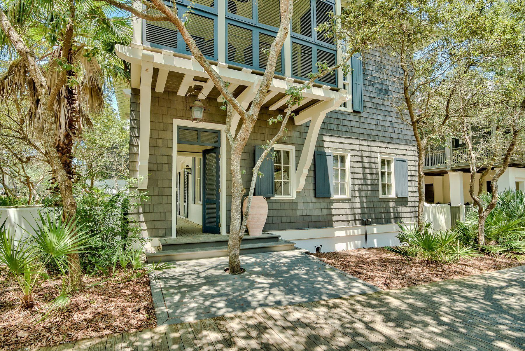 INVESTOR OPPORTUNITY! Nestled South of Scenic Highway 30A in the heart of Rosemary Beach, this quintessential Bobby McAlpine designed coastal retreat is an investor's dream. The spacious 6 bedroom, 6.5 bathroom layout offers ample opportunity to create a true masterpiece through countless rejuvenation options.The grand foyer of the first floor is flanked by a spacious living room on one side and dining/kitchen on the other. Upon taking the stately staircase to the second floor, you will find a master suite and two guest suites, each with en suite bath. The wrap around porch of the second floor also features a sleeping porch directly off of the master bedroom. The third floor is home to a bedroom, bunk room, and living area.