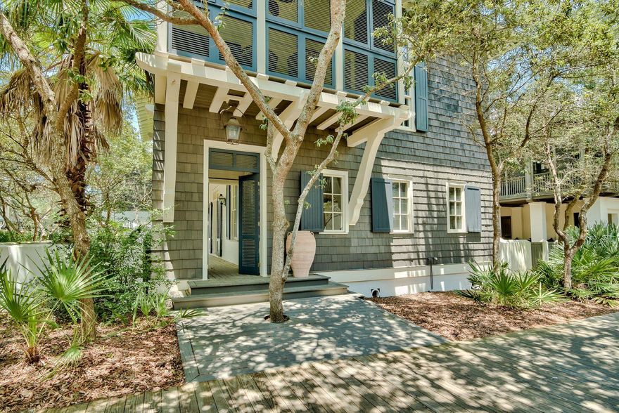 INVESTOR OPPORTUNITY! Nestled South of Scenic Highway 30A in the heart of Rosemary Beach, this quintessential Bobby McAlpine designed coastal retreat is an investor's dream. The spacious 6 bedroom, 6.5 bathroom layout offers ample opportunity to create a true masterpiece through countless rejuvenation options.The grand foyer of the first floor is flanked by a spacious living room on one side and dining/kitchen on the other. Upon taking the stately staircase to the second floor, you will find a master suite and two guest suites, each with en suite bath. The wrap around porch of the second floor also features a sleeping porch directly off of the master bedroom. The third floor is home to a bedroom, bunk room, and living area.