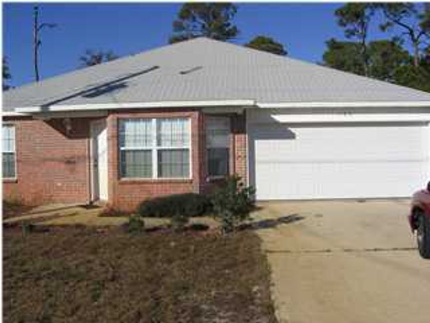 Great floorplan. Tray ceiling in living room. Some new carpeting. Large kitchen with lots of storage space. 2 car garage