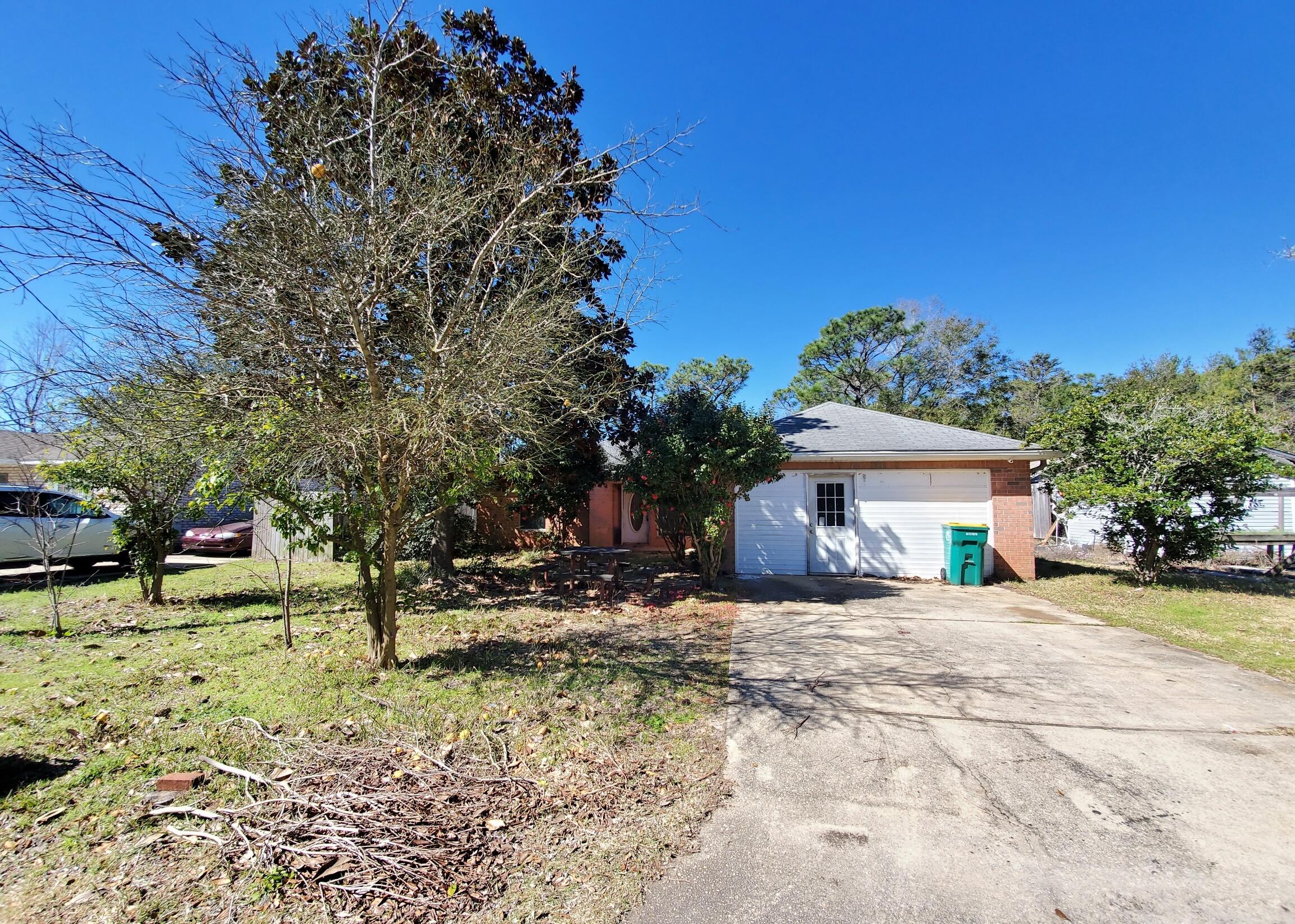 Calling all investors! Cute 3 bedroom 2 bath home that is just full of potential! This adorable fixer-upper boasts 1572 square feet of living space, plus an additional room that has been converted from the garage. Tall ceilings, open living space, and large master suite. This property is distressed and does need updates and TLC, but it could be a great property once fixed up. The lot next door is not part of the property. Vacant and easy to show.