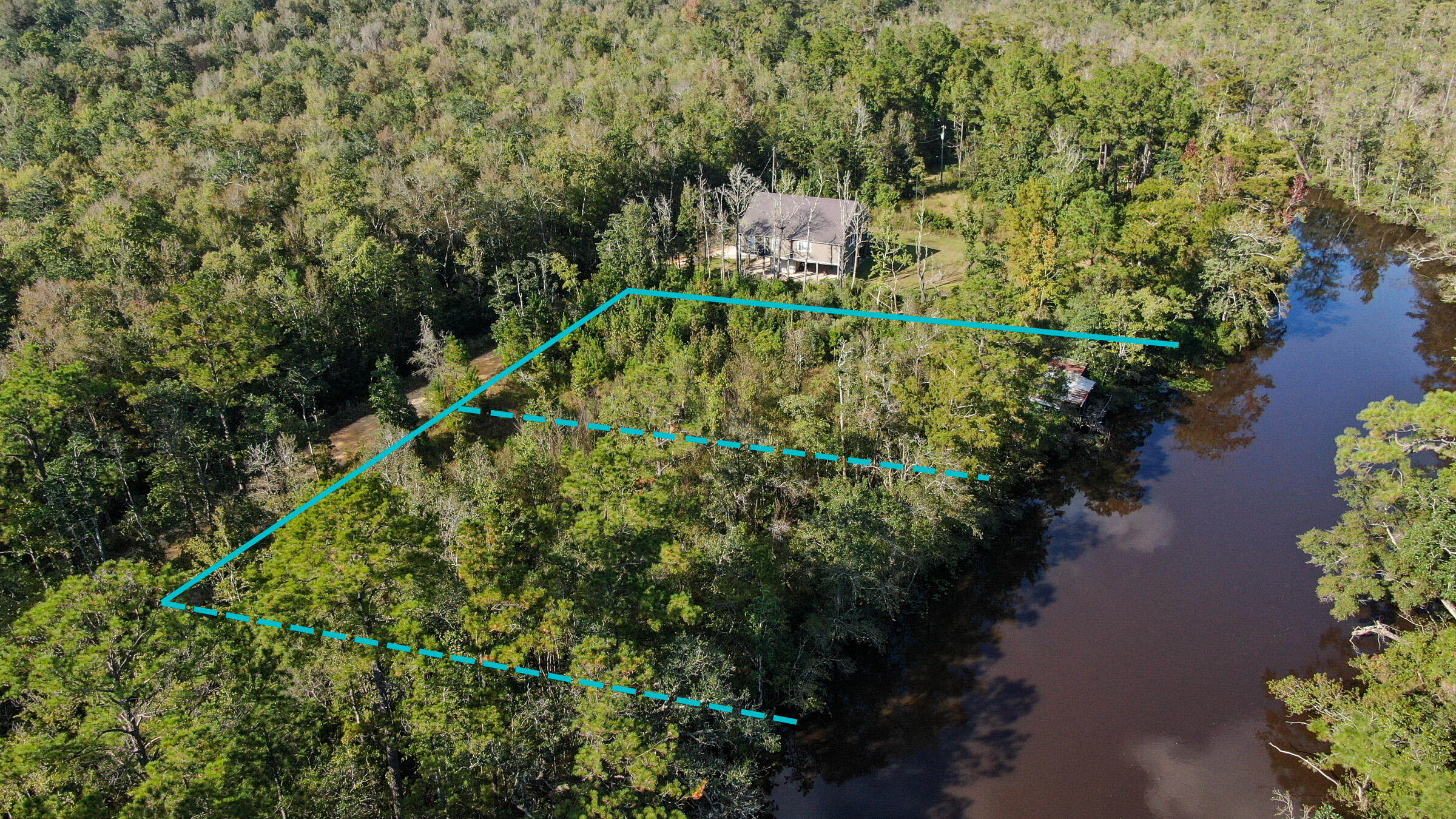Beautiful 1/2 acre lot on Alaqua Creek with access to the bay on a wave runner or small boat. Build your dream home or a fabulous fish camp in the heart of Freeport. And only minutes to anywhere! Adjacent 1/2 acre is also available for purchase. This property is totally buildable with credits purchased from the land bank in order to offset the wetlands on the property and proper permitting. Approximately +/- $8000-$15000