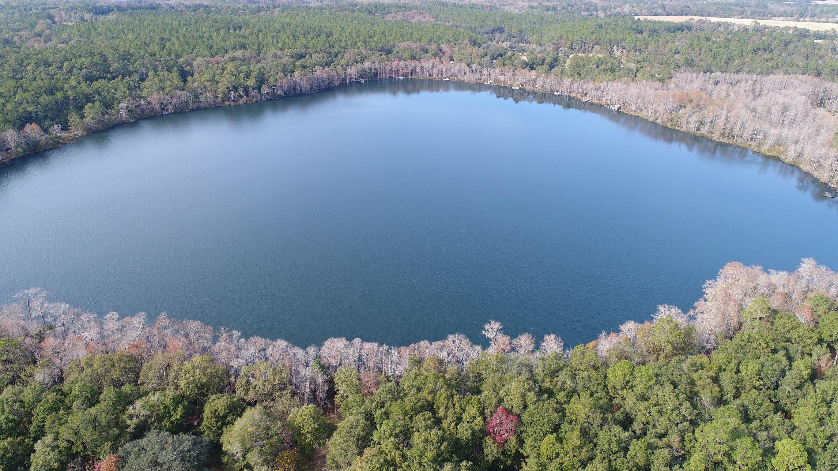 Two great building lots on beautiful and scenic Blue Pond Lake! Lot 34 features an existing RV pad with water and electric as well as a nice dock on the water. Located just over the Holmes County line, this property features wooded lots on the water with an abundance of privacy. Design your home on both lots , keep one for family or build and then sell the other. Make an appointment today to see these picturesque lots!