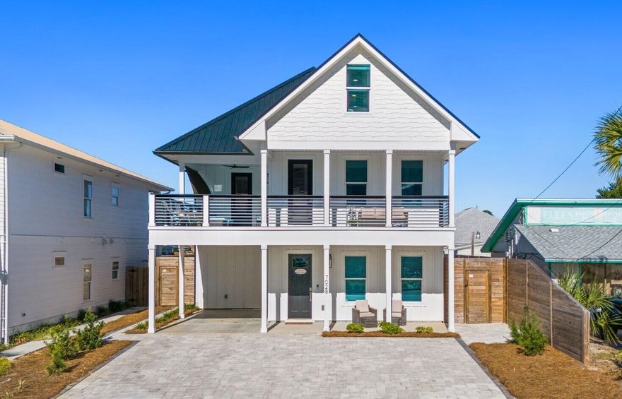 A premier investment and luxury coastal retreat, this custom beach home is positioned just a short 5-minute walk from Public Beach Access 15 and the iconic emerald waters of Panama City Beach. Purposefully designed to host large groups, it sleeps up to 19 guests and delivers impressive rental projections exceeding $130,000 annually. The open main level showcases a gourmet kitchen with granite countertops, stainless steel appliances, and walk-in pantry flowing seamlessly to the covered patio, private pool, and outdoor shower. The primary suite provides resort-style comfort with a soaking tub, walk-in shower, and spacious closet, while multiple bunk rooms including a third-floor bunk suite with lounge area enhance rental versatility. A second-floor family room with a wet bar opens to a sunset-view sundeck ideal for entertaining. Perfectly located on the desirable East End near local favorites like Schooners and FINNS Barista Bar & Snack Shack, this fully furnished property offers superior guest appeal and proven performance in one of PCB's strongest rental corridors.