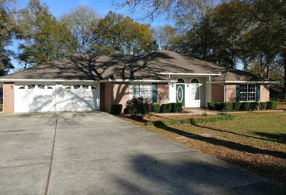 Spacious suburban ranch home sits on a large tree lined lot in North WaltonCounty. Home is priced right and ready for your updates. This 4 bed 2 bath home features trey/coffered ceilings, spacious kitchen with a breakfast room, family room with a fireplace; and a split bedroom plan. The attached porch is perfect for entertaining with an in ground pool. Community is close to the EglinAir force base,and shopping. Don't miss this opportunity- schedule a visit and make an offer.