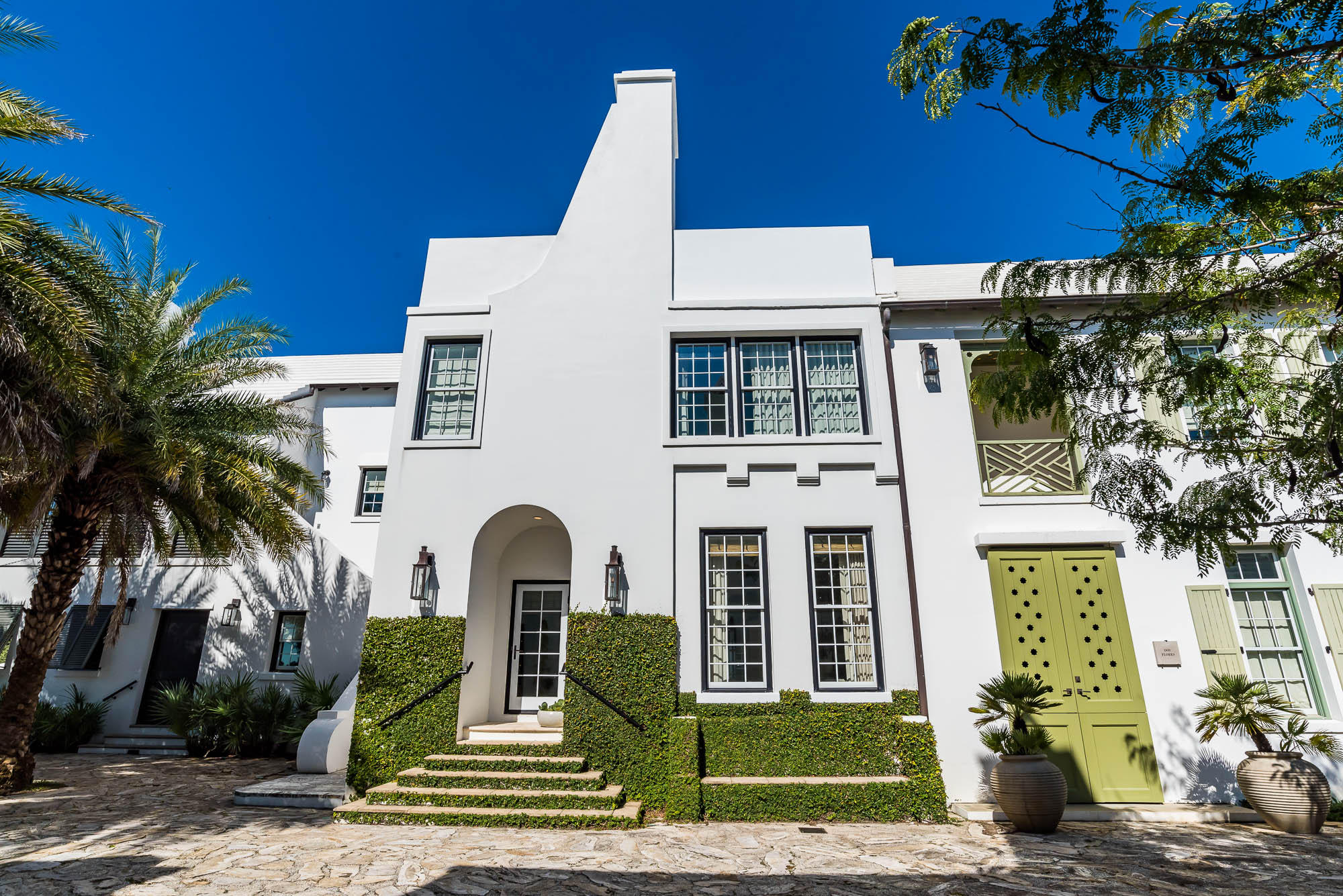 This stunning 3 bedrooms, 2 1/2 bath home was designed by the renowned architectural firm and Town Planners of Alys Beach, Duany Plater-Zyherk (DPZ) It is a certified ''Fortified Home'' meeting the Owning a home designed by DPZ is certainly a coveted opportunity, especially in the town of Alys Beach.The living room, kitchen and master bedroom feature expansive windows that flood the rooms with natural light. The kitchen opens up to the plunge pool and lounge area. The living room is modern and ready for entertaining. The kitchen is professionally equipped with top of the line stainless steel appliances, Wolf stove, Sub-Zero refrigerator/freezer. marble countertops, custom cabinetry, and Italian limestone flooring. There is also a -1/2 bath near the back door is perfect for coming i from the beach or pool.
The second floor has two bedrooms overlooking Sea Garden Walk pedestrian path. There is also a landing with a day bed for reading or rest.
The bathroom on the second floor is finished in black and white marble, sophisticated and clean...
The third floor boasts a terrace with built in grill and dining area overlooking beautiful Sea Garden Walk that leads to the Gulf of Mexico and the upcoming private Beach Club, for Owners only, (ground breaking Dec. 2019) to the south. Heading North on the pedestrian path is a large fire pit and lovely Lake Marilyn
The home was professionally decorated by renowned and published Atlanta designer Melonie Turner.
This home is being sold furnished.