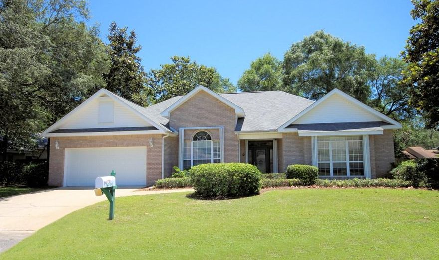 Beautifully updated home on a quiet dead end street in the gated community of Magnolia Plantation in Bluewater Bay. This 1-story home with a split bedroom floorplan and multiple living areas allows for plenty of space for any sized family! Recent updates include marble look granite in shades of creams, taupes and grays in a spacious kitchen that is open to the family room. Rich engineered hardwood throughout most of the main living areas, new paint, new ceiling fans, newly constructed breakfast bar, updated hardware, appliances and light fixtures with ''just the right touch'' of crystal. The large fully fenced backyard is perfect for kids and pets and the pergola covering the back patio is the ideal spot for back yard bar-b-q's. Welcome home to Magnolia Plantation in Bluewater Bay!