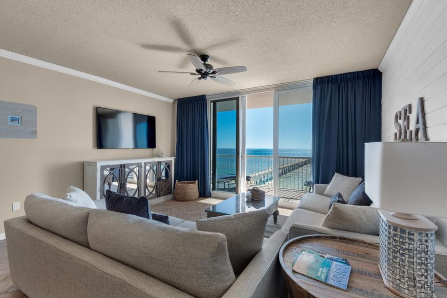 Experience Coast Living at its best!  Welcome to stunning Gulf front balcony views in this beautifully updated 9th floor condo at Summerwind Resort.  Breathe in the gentle breezes and serene sunsets inviting you from the open living dining areas to the spacious outdoor balcony.  This condo offers Italian herringbone wood plank tile thru out, shiplap accents and new furnishings, as well as new dishwasher, refrigerator, washer/dryer, kitchen and bath faucets, and updated lighting.  Summerwind offers a community pool, hot tub, fitness center, seasonal beach store, ample guest parking, walking proximity to nearby restaurants and the abundant nature of wonder nature on wonderful Navarre Beach.  This is a turnkey property with established rental history.  Rentals of $60k in 2024.