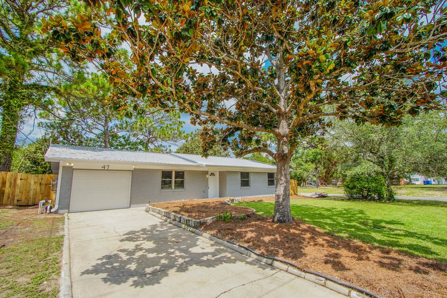 Stunning Renovated Brick Home in the desirable Shalimar Florida. Minutes from Eglin Afb, Fort Walton Beach dining, shopping & beaches. Quick access to Meigs beach boat launch and neighborhood park. This renovated 4 bedroom 2 bath 1 car garage home offers great space on this large corner lot on a secluded cul-de-sac street. Interior features include fresh grey colors through out, a brand new kitchen offering an open space, granite counter tops, subway tile backsplash, stainless steel appliances, shaker style cabinets and dark laminate wood flooring. This home offers 2 living spaces with tons of optinos for bonus or entertaining space or an extra large dining room you choose! Brand new carpet in the bedrooms, updated bathrooms, new copper wiring & electrical panels. You will love the outside