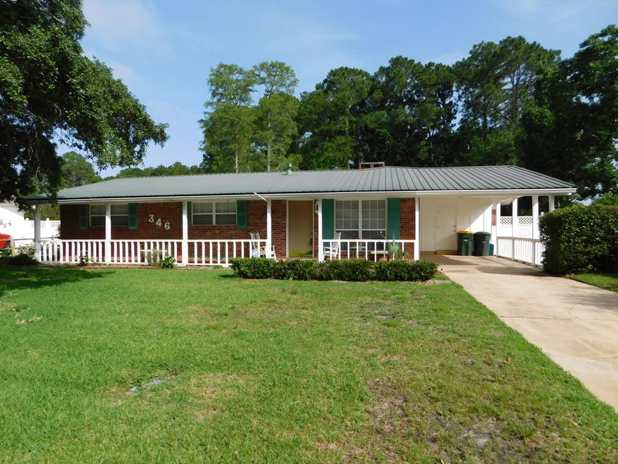 5 Bedroom 3 Bath POOL HOME on .38 Acres! This MOVE-IN-READY Home has a Metal Roof! There are 3 Bedrooms, 2 Baths in the main area. It also has 2 Bedrooms, a Full Bath, Book shelves, a separate HVAC Unit a 2nd living room w/tile flooring, a Fireplace and a Laundry Room in the back of the home: Used as a Guest Suite by current owners. The Eat-In Kitchen/Dining Room is HUGE and has its own Fireplace! There is a large pantry, lots of counter space and newer appliances! The front Living Room is nicely sized and has laminate flooring. The original 3 Bedrooms & hallway have low maintenance laminate flooring & the 2 front bathrooms have tile. The only rooms w/carpet are the 2 bedrooms in the guest suite. The back yard is huge with a Sparkling pool and plenty of grass area for pets and play!