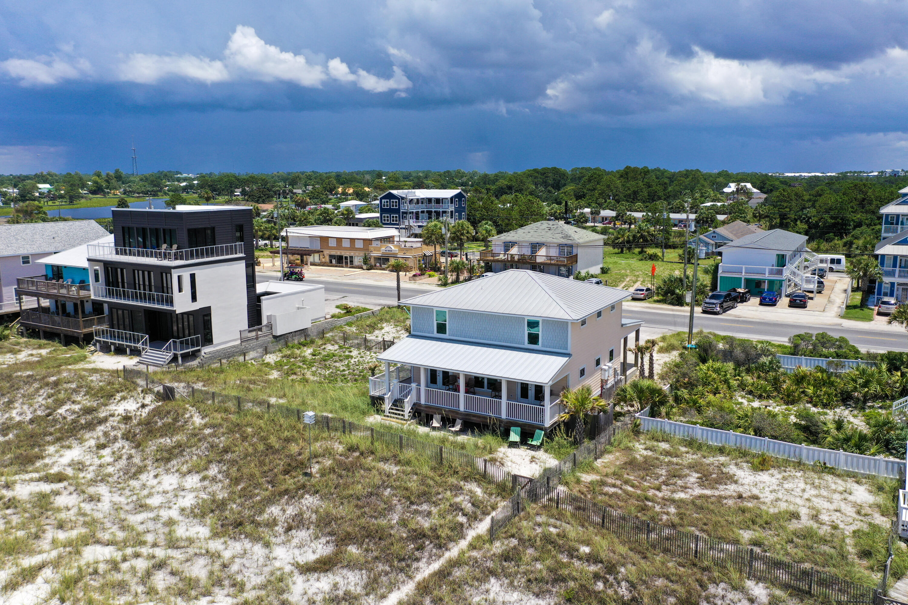 LOCATION, LOCATION, LOCATION!!! Rare opportunity to own Gulf Front home in Panama City Beach. Short walking distance to PIER PARK, which is full of tons of shopping and delicious restaurants! This 5BR/ 4BA has expansive views of the Gulf of Mexico. This home features an open floor plan with the living room and kitchen combined. The master bedroom is also located on the main level with a his and her bathroom. The additional 4 bedrooms are located on the second level of the home. There is also a mini kitchen on the second level. Two of the bedrooms on the second level have beautiful gulf views too. Don't miss this opportunity!