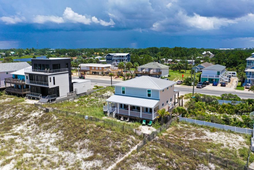 LOCATION, LOCATION, LOCATION!!! Rare opportunity to own Gulf Front home in Panama City Beach. Short walking distance to PIER PARK, which is full of tons of shopping and delicious restaurants! This 5BR/ 4BA has expansive views of the Gulf of Mexico. This home features an open floor plan with the living room and kitchen combined. The master bedroom is also located on the main level with a his and her bathroom. The additional 4 bedrooms are located on the second level of the home. There is also a mini kitchen on the second level. Two of the bedrooms on the second level have beautiful gulf views too. Don't miss this opportunity!