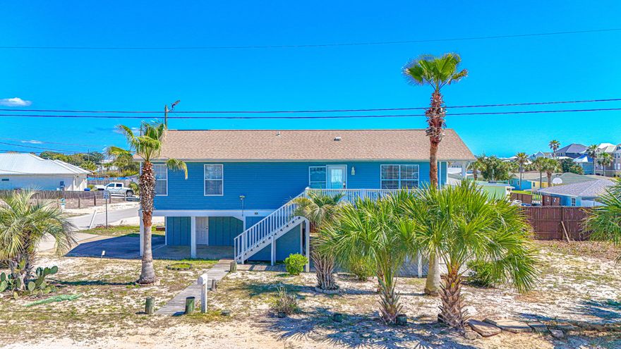 Are you dreaming of a place near the beach with income potential? If so, 206 Shasta Street is definitely worth a look. Located in the desirable Keiko Beach community on the quiet west end of Panama City Beach, this unique property offers two separate living quarters and is just 500 feet from Beach Access 92!  The upstairs level features a 3 bedroom, 2 bathroom layout with a spacious porch where you can enjoy peek-a-boo Gulf views and coastal breezes. Downstairs, you'll find a fully equipped studio apartment with its own kitchen and full bathroom, making it perfect for guests, extended family, or short-term/long-term rental income. The home sits on a spacious corner lot in a golf cart friendly community known for its laid-back beach lifestyle. Add pool? ok sewer on shasta & Bataan