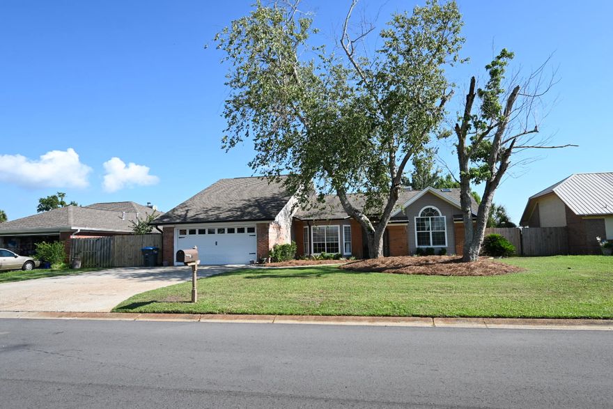 Welcome to Derby Woods, a desired neighborhood nestled in the heart of Lynn Haven, Florida. This home epitomizes modern living, boasting updates that blend style and functionality. Step into this renovated home, where no detail has been spared. The kitchen stands as the heart of the home, recently rejuvenated with modern finishes, sleek countertops, and top-of-the-line appliances, making meal preparation a delight. From the moment you set foot on the updated flooring, you'll appreciate the seamless flow that leads you through the home. The bathrooms have been thoughtfully redesigned, offering a spa-like experience with contemporary fixtures and finishes, ensuring both comfort and elegance.