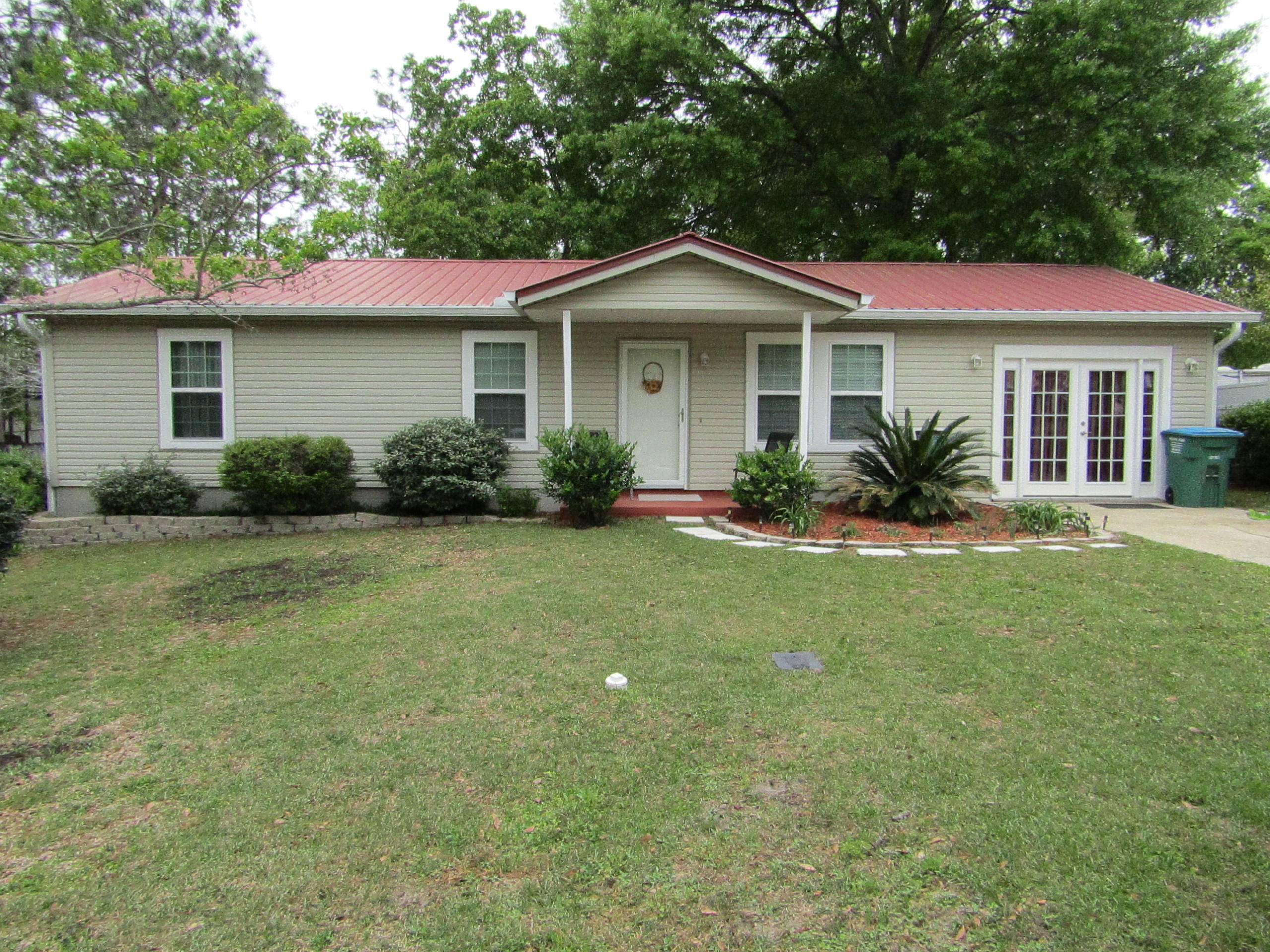Beautiful 3 bedroom 2 bath home centrally located in Crestview. Owner has converted the one car garage into a bonus room or potentially a fourth bedroom. Home has a metal roof. Exterior of Home has just been pressure washed. Brand new white seamless gutters just installed on the front of the home.