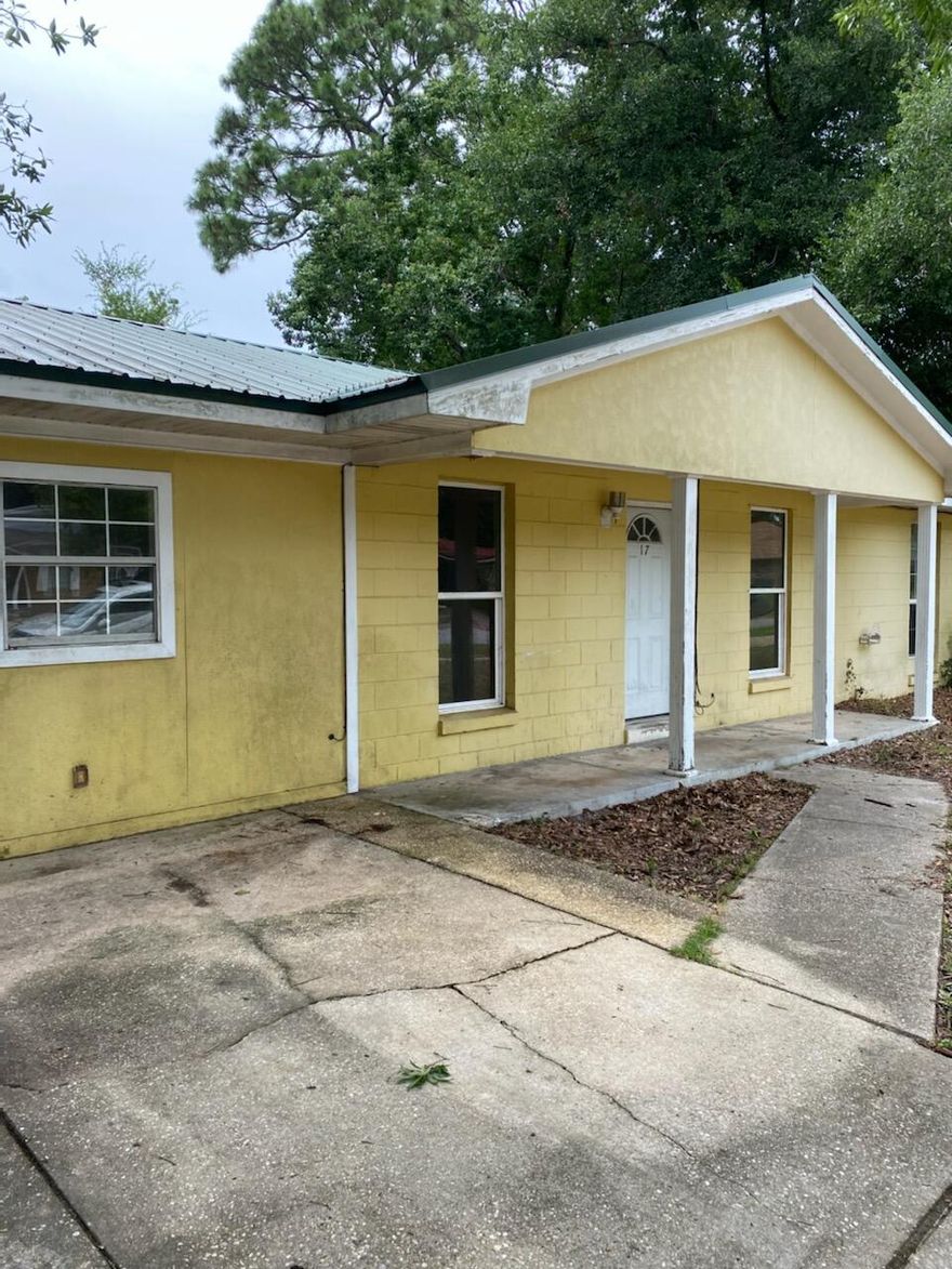 Close to Everything you Need! This Home is Ready for You to Renovate. Metal Roof is About 4 Years Old.  New Windows were put in at the Same Time. AC - 2012. Appliances are 'as is'. (buyer to verify measurements)