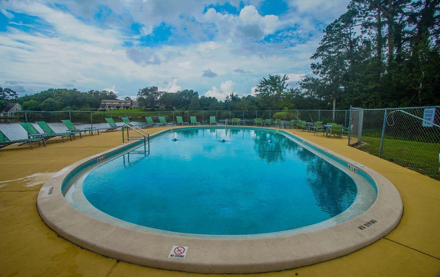 Highest and best b noon 3/1/2022Looking for a charming home not farm from beaches, bay, and base ?  Enjoy sitting on your patio having a cup of coffee while watching the sun coming up over the bayou. This unit is located right at the swimming pool.  Coming in to the living room, kitchen, and dining room that has been recently tiled and the main bedrooms have hardwoods. All measurements are approximate and should be verified by buyer. The complex dose not allow short term rentals.