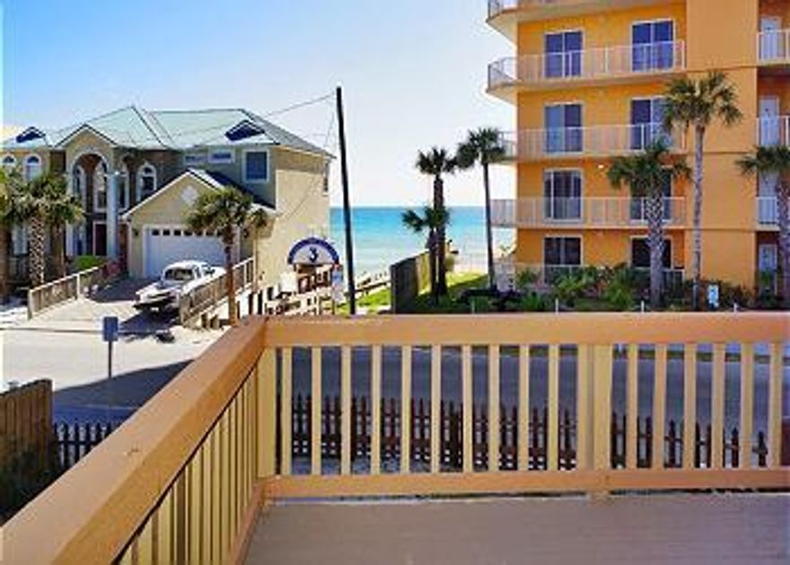 MASSIVE $200,000 PRICE REDUCTION, DOWN TO $399,000 FROM $599,000. SUPER MOTIVATED SELLER, PLEASE SHOW AND BRING OFFER. SEEEPS 16+, RENTAL MACHINE! This property is being sold fully furnished, everything goes! This huge beach house sleeps 16+ and is located right across the street from beach access and has a great beach view from the large upstairs deck. What makes this house very special is that it has 3 kitchens and 3 separate living room areas which makes it great for multiple families. Plus, it has an outdoor bar! From the minute you walk in the door you'll know this house is really special. The owners remodeled it so that everything is fresh.GROSS RENTAL INCOME IS LOCATED UNDER DISCLOSURES.HERE ARE THE ANNUAL EXPENSES:$1,263.48 (Insurance), $4,529.58 (Taxes)$4,847.00 (Utility)