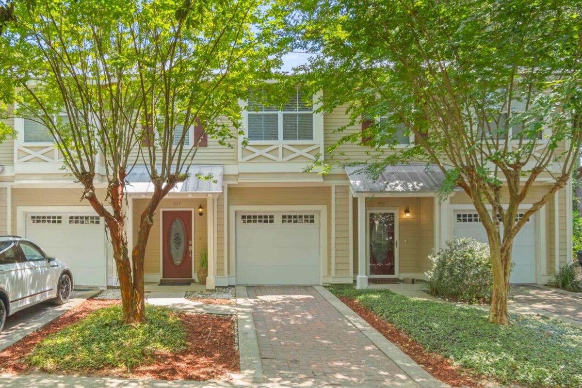 This stunning newly renovated Destin townhome perfectly blends modern elegance with convenience. Ideally located near popular restaurants, shopping, parks, and top-rated schools, and military bases. It offers a lifestyle where everything you need is just minutes away. Recently remodeled with a clean and sophisticated feel, the home features spacious bedrooms that are both cozy and stylish, allowing ample natural light. The open living room is perfect for relaxing or entertaining, seamlessly flowing into the rest of the home for an airy, inviting atmosphere.The dining room stands out with its elegant design, ideal for everything from casual family meals to lavish dinner parties. The gourmet kitchen is a chef's dream, equipped with high-end appliances and plenty of counter space,